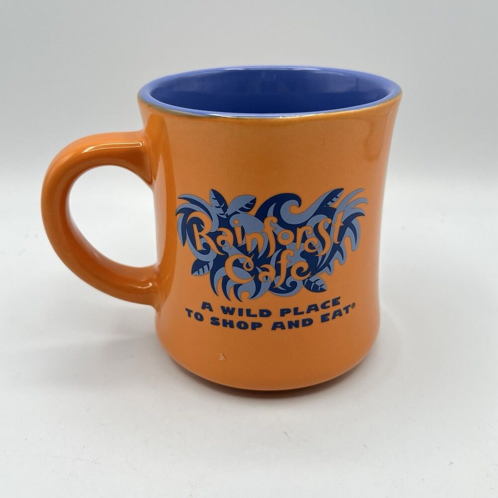 1999 Rainforest Cafe Mug Cup Souvenir Orange  "A WILD PLACE TO SHOP AND EAT"